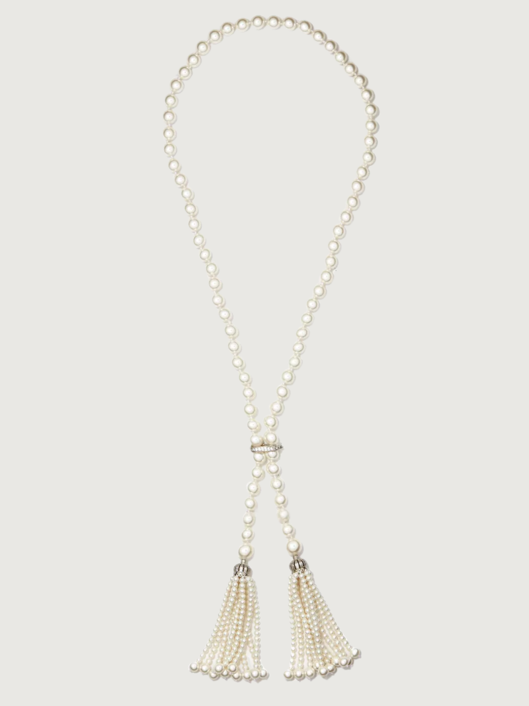 Long pearl necklace hot sale with tassel